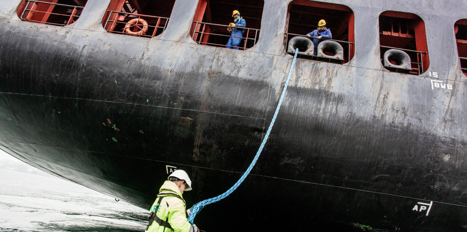 Containership crew loading the anchor